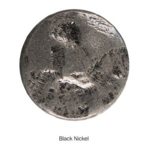 Rough black nickel coin close-up.