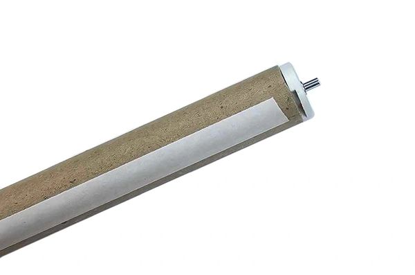 Brown cylindrical roller with metal ends.